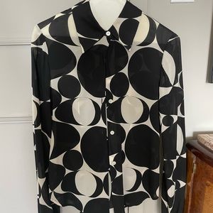 Theory size small, black and white silky type material blouse. Geometric print.